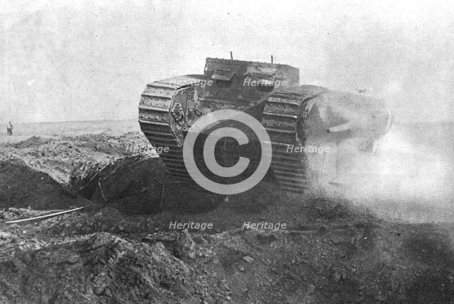 'Un tank en action; la tourelle de gauche est armee d'un petit canon de marine a tir rapide', 1916. Creator: Unknown.