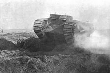 Un tank en action; la tourelle de gauche est armee d'un petit canon de marine a tir rapide 1916. Creator: Unknown
