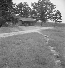 Untitled, 1935-1942. [African American family on their porch]. Creator: Unknown