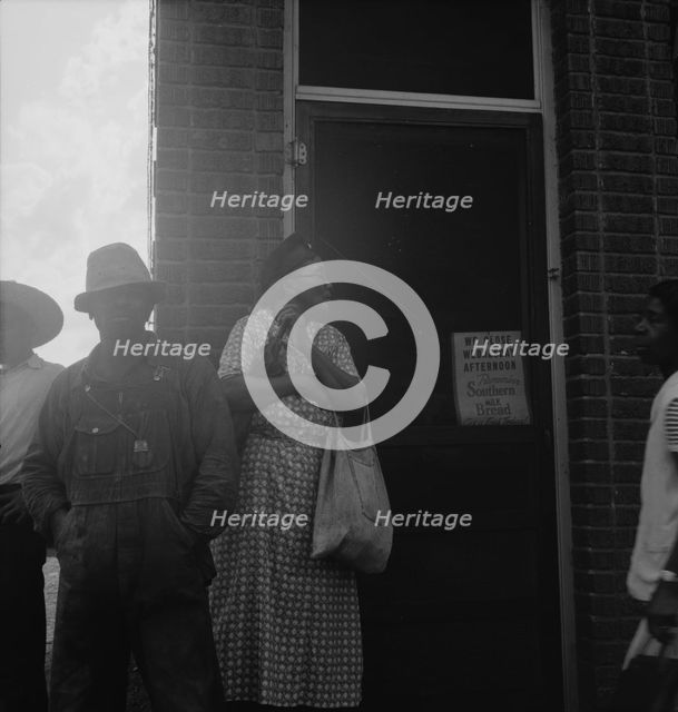 Untitled, 1935-1942. [African-Americans outside a shop]. Creator: Unknown.