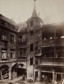 Untitled [courtyard with balconies and spiral staircase], 1870s. Creator: Unknown