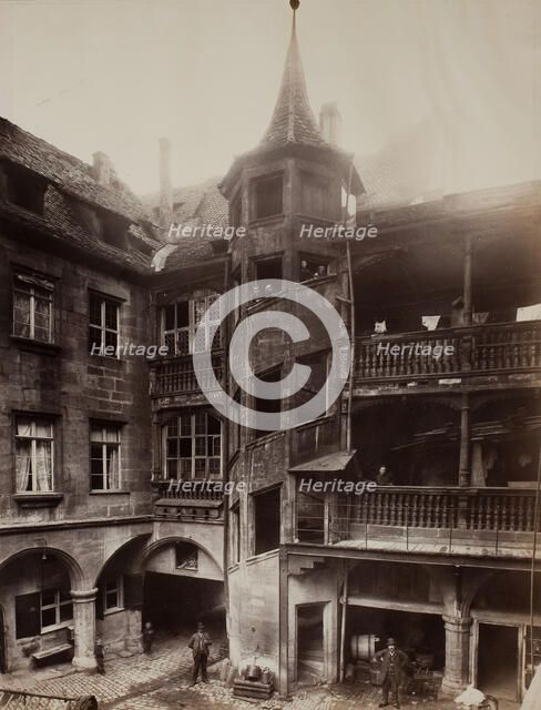 Untitled [courtyard with balconies and spiral staircase], 1870s.  Creator: Unknown.