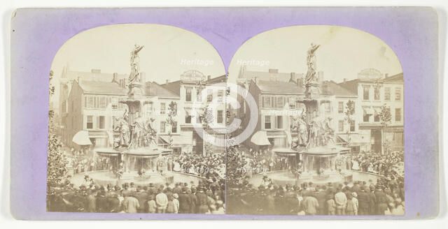 Untitled [crowd round a fountain], 1875/99.  Creator: Unknown.