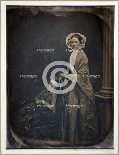 Untitled (A Woman in Bonnet and Shawl, with her Seated Son), c. 1850. Creators: Albert Sands Southworth, Josiah Johnson Hawes.