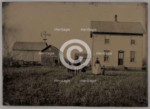 Untitled (A Man, a Woman, and Three Children Standing in Front of a Farmhouse), 1875. Creator: Unknown.