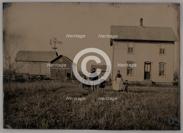 Untitled (A Man, a Woman, and Three Children Standing in Front of a Farmhouse), 1875. Creator: Unknown.