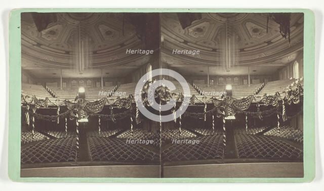 Untitled [auditorium decorated with US flags], late 19th century. Creator: Wright & Hartwell.