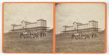 Untitled [group portrait of men and boys outside a large building], 1875/99. Creator: Unknown