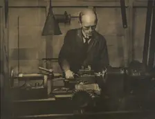 Untitled (Industry; man working lathe), 1920s. Creator: AJ Wales