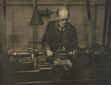 Untitled (Industry; man working lathe), 1920s. Creator: AJ Wales