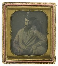 Untitled [man smoking cigar], 1839/99. Creator: Unknown