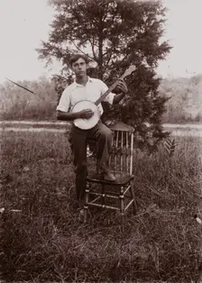 Untitled (man with banjo, neg, #1), c1931, printed c1975. Creator: Wendell Hotter