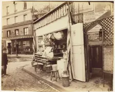 Untitled [street scene with cheese shop], 1898. Creator: Eugene Atget