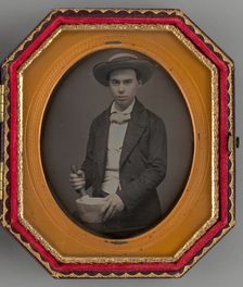 Untitled (Portrait of a Boy Holding a Mortar), 1858. Creator: Unknown