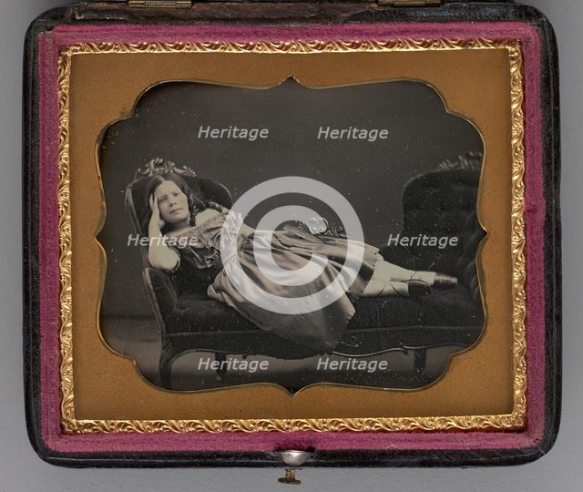 Untitled (portrait of a girl reclining on a chaise longue), 1855.  Creator: John Adams Whipple.