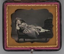 Untitled (portrait of a girl reclining on a chaise longue), 1855. Creator: John Adams Whipple