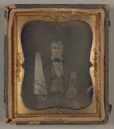 Untitled [portrait of a man holding carpentry tools], 1839/99. Creator: Unknown