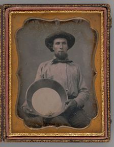 Untitled (Portrait of a Man Wearing a Hat, Holding a Mining Pan), 1854. Creator: Unknown