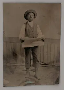 Untitled (Portrait of a Standing Man Holding a Newspaper), 1875. Creator: Unknown
