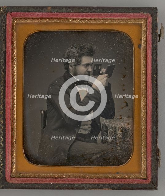 Untitled (Portrait of Man Looking Through a Stereoscope), 1856. Creator: Unknown.