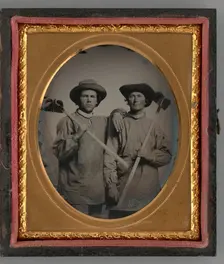 Untitled (Portrait of Two Men Holding Shovels), 1868. Creator: Unknown