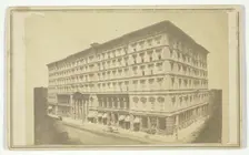 Untitled [Victorian building with shops on the ground floor], c. 1865. Creator: R. F. Adams