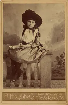 Uncle Toms Cabin. Era. Studio portrait of a girl., about 1880. Creator: F. Haight & Company