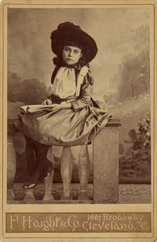 Uncle Toms Cabin. Era. Studio portrait of a girl., about 1880. Creator: F. Haight & Company