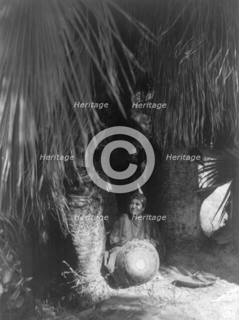 Under the palms-Cahuilla, 1905, c1924. Creator: Edward Sheriff Curtis.