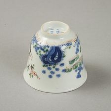 Underglaze blue month cup with polychrome enamelled decoration of a prunus tree