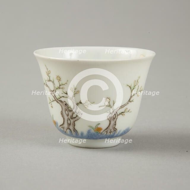 Underglaze blue month cup with polychrome enamelled decoration of a prunus tree. Artist: Unknown.