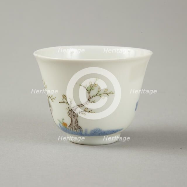Underglaze blue month cup with polychrome enamelled decoration of a prunus tree. Artist: Unknown.