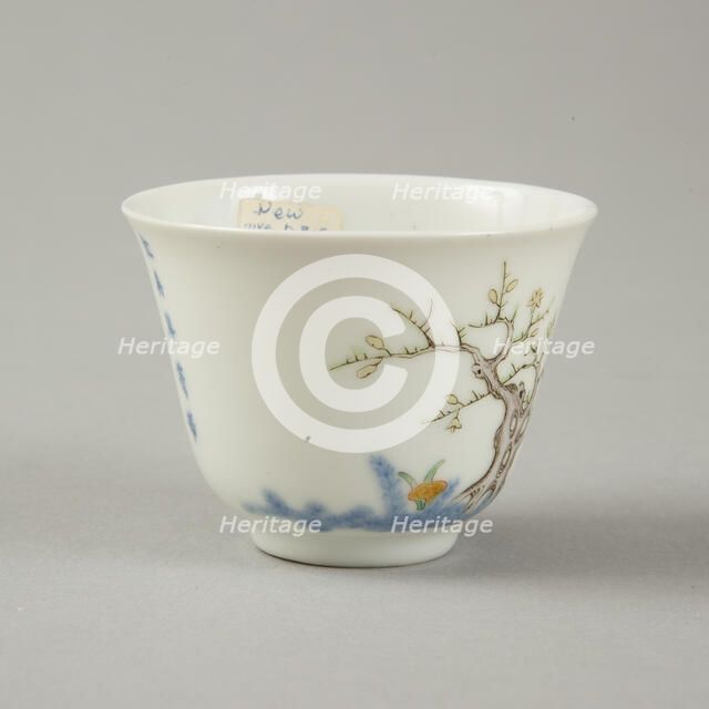 Underglaze blue month cup with polychrome enamelled decoration of a prunus tree. Artist: Unknown.