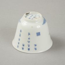 Underglaze blue month cup with polychrome enamelled decoration of a prunus tree