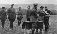 Une ceremonie militaire a Salonique; Le general Sarrail decore par le general Mahon..., 1916. Creator: Unknown