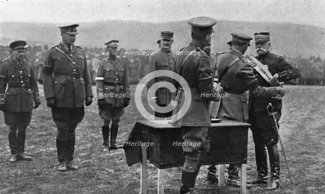 'Une ceremonie militaire a Salonique; Le general Sarrail decore par le general Mahon..., 1916. Creator: Unknown.