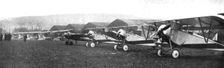 Une escadrille d'avions de chasse : au premier plan, trois Nieuport repides; ensiute..., c1916. Creator: Unknown