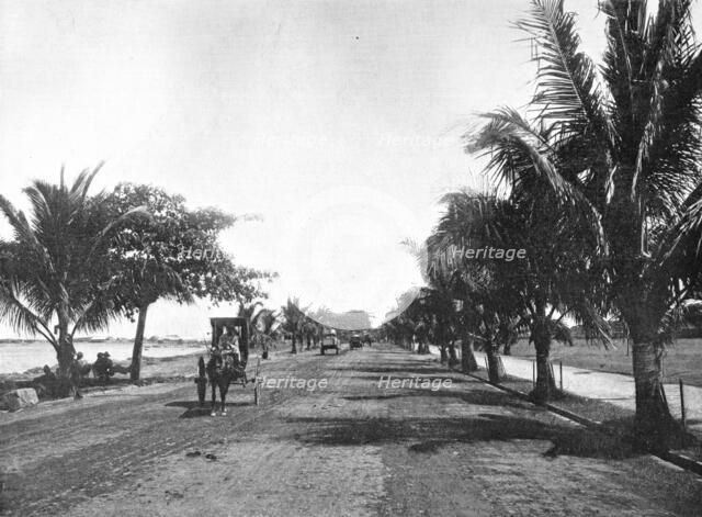 ''Une rue a Manille;Les Terres Du Pacifique', 1914. Creator: Unknown.