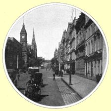 'Une rue de grande ville australienne: Collins Street, Melbourne; Les Terres Du Pacifique 1914. Creator: Unknown