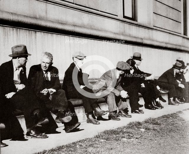 Unemployed men sitting outside the Public Library, San Francisco, California, USA, February 1937. Creator: Unknown.