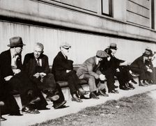 Unemployed men sitting outside the Public Library, San Francisco, California, USA, February 1937. Creator: Unknown