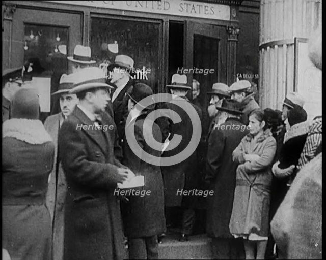 Unemployed People Gathering on the Streets , 1929. Creator: British Pathe Ltd.