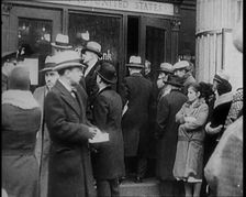 Unemployed People Gathering on the Streets , 1929. Creator: British Pathe Ltd
