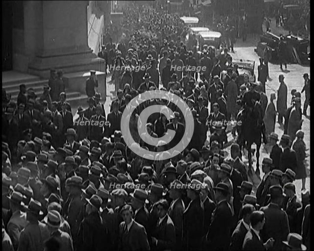 Unemployed People Gathering on the Streets , 1929. Creator: British Pathe Ltd.