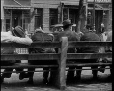 Unemployed People Sitting On a Bench, 1932. Creator: British Pathe Ltd