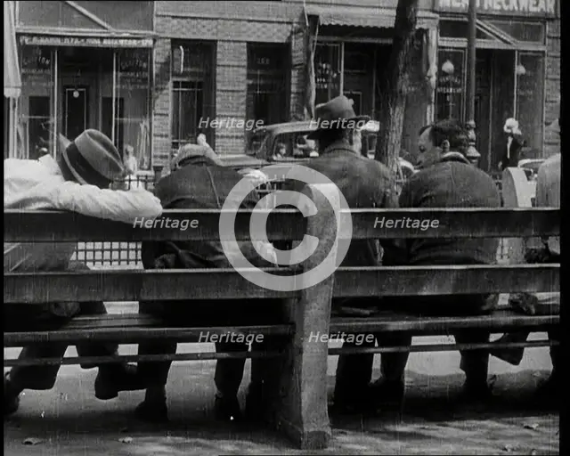 Unemployed People Sitting On a Bench, 1932. Creator: British Pathe Ltd.