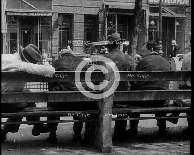 Unemployed People Sitting On a Bench, 1932. Creator: British Pathe Ltd.