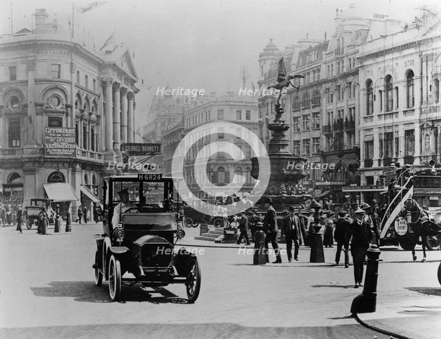 Unic taxi in Piccadilly circus, London circa 1910. Creator: Unknown.