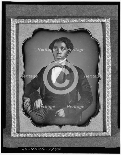 Unidentified man, three-quarter length portrait, full face, with arm on..., between 1849 and 1860. Creator: Unknown.