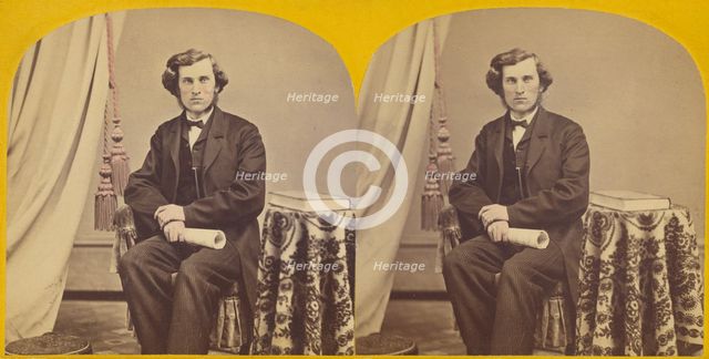 Unidentified man with muttonchops seated, holding a rolled paper, about 1860. Creator: Unknown.